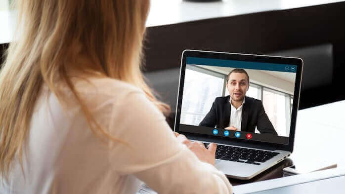 Person on a video call on a laptop